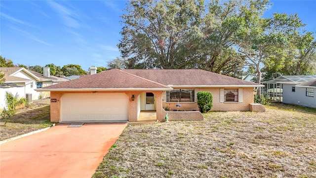 ranch-style house with a garage and a front yard