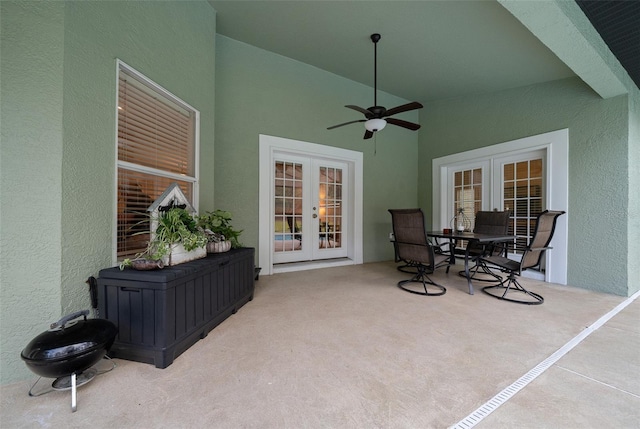 view of patio featuring ceiling fan and french doors