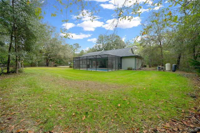 view of yard featuring a lanai