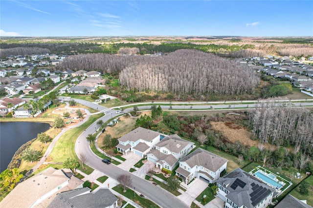 drone / aerial view featuring a water view