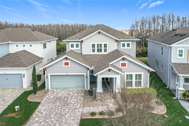 view of front of property with a garage