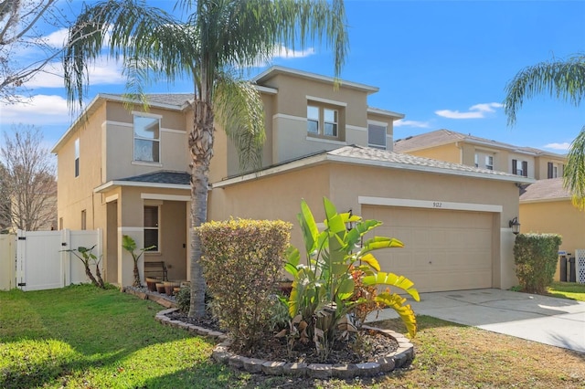 view of front of home with a garage and a front yard