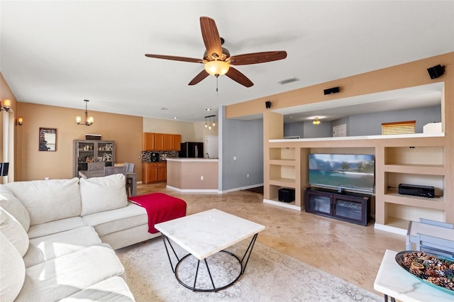 tiled living room featuring built in features and ceiling fan