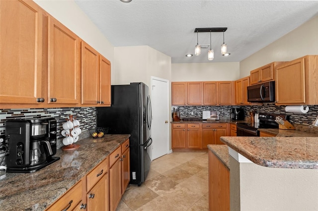 kitchen with tasteful backsplash, decorative light fixtures, black electric range, kitchen peninsula, and stone counters