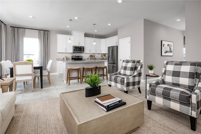 living room with light tile patterned floors