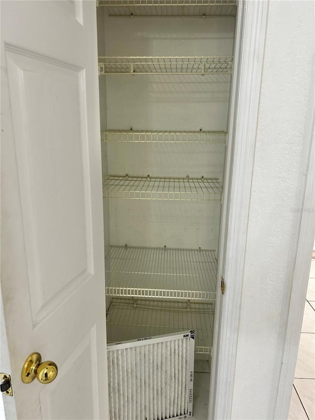 closet with radiator heating unit