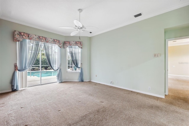 6112 Kinlock Ave, Spring Hill, FL 34608 - carpeted empty room featuring crown molding, a ceiling fan, and baseboards