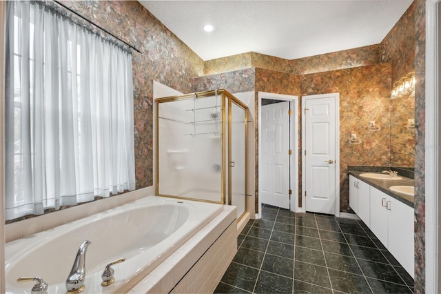 6112 Kinlock Ave, Spring Hill, FL 34608 - full bath with a shower stall, a garden tub, double vanity, tile patterned floors, and wallpapered walls