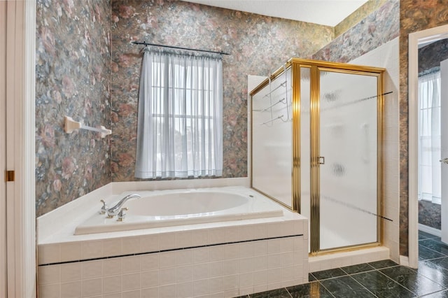 6112 Kinlock Ave, Spring Hill, FL 34608 - full bathroom with a stall shower, wallpapered walls, and a garden tub