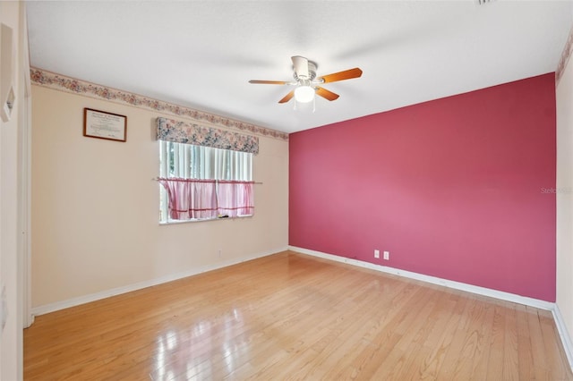 6112 Kinlock Ave, Spring Hill, FL 34608 - unfurnished room with ceiling fan, wood finished floors, and baseboards