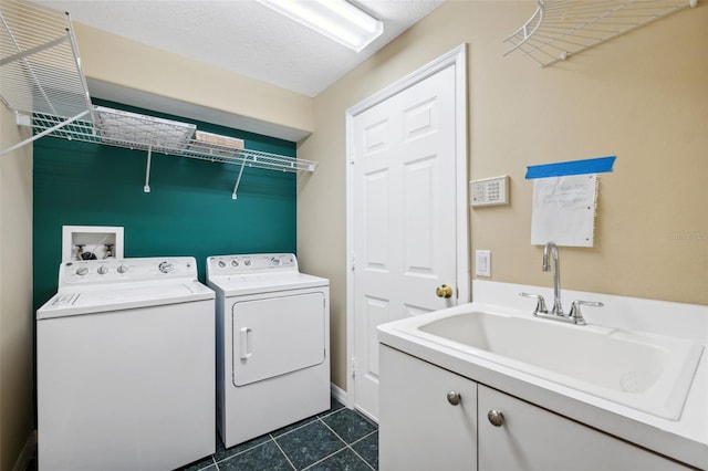 6112 Kinlock Ave, Spring Hill, FL 34608 - laundry area with independent washer and dryer, cabinet space, and dark tile patterned floors