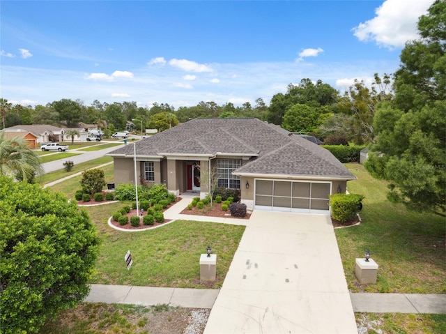 6112 Kinlock Ave, Spring Hill, FL 34608 - single story home featuring an attached garage, a front yard, concrete driveway, and roof with shingles