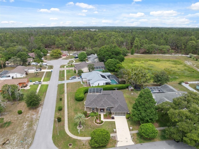 6112 Kinlock Ave, Spring Hill, FL 34608 - aerial view of residential area with a forest