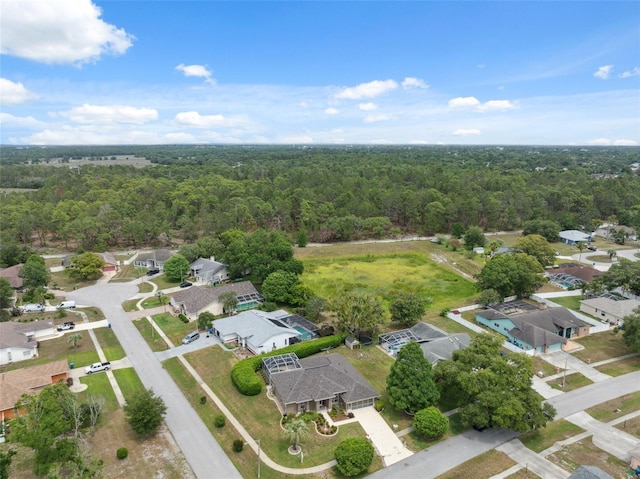 6112 Kinlock Ave, Spring Hill, FL 34608 - aerial view of property's location with a forest and nearby suburban area