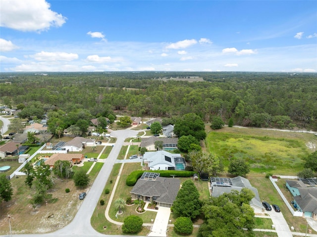 6112 Kinlock Ave, Spring Hill, FL 34608 - aerial view of property and surrounding area featuring a forest and nearby suburban area