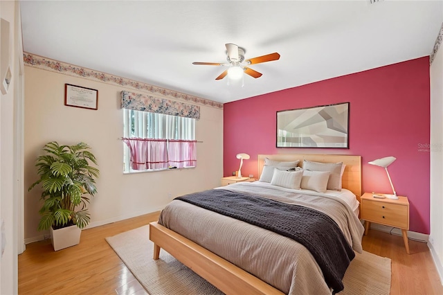6112 Kinlock Ave, Spring Hill, FL 34608 - bedroom with light wood-style flooring and ceiling fan