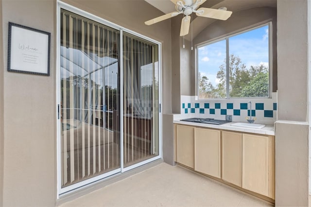 6112 Kinlock Ave, Spring Hill, FL 34608 - unfurnished sunroom featuring a sink