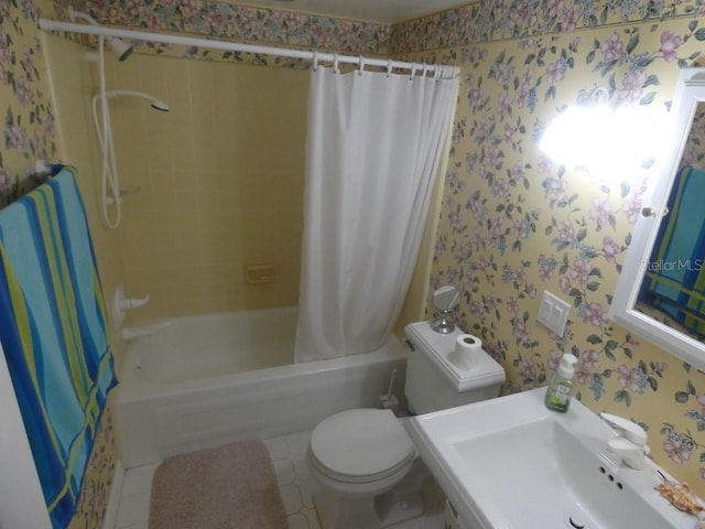 full bathroom with shower / bath combination with curtain, tile patterned floors, toilet, and sink