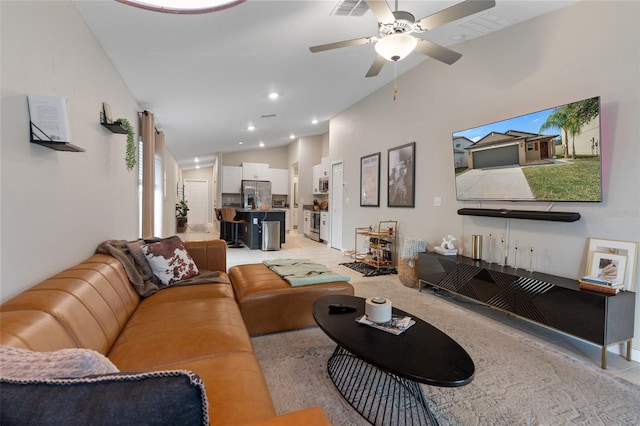 living room with vaulted ceiling and ceiling fan