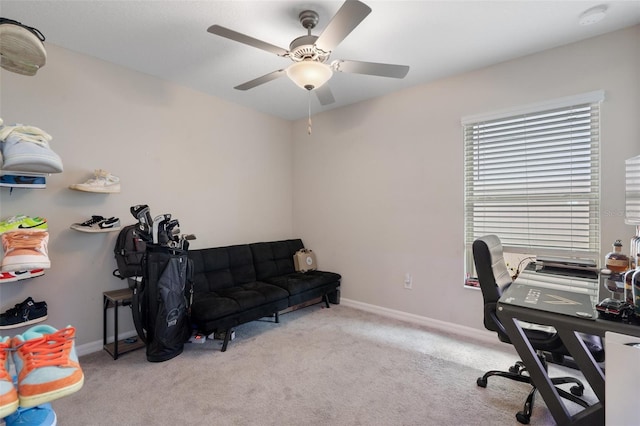 office with light carpet and ceiling fan