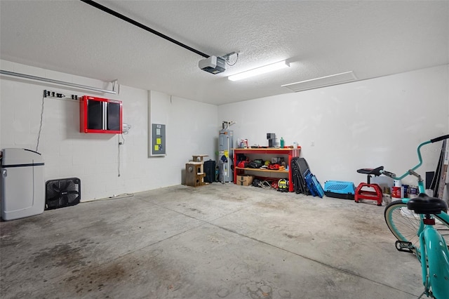 garage with a garage door opener, electric panel, and water heater