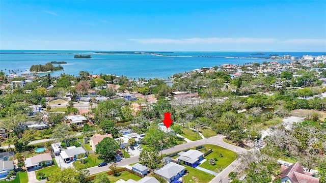 bird's eye view with a residential view and a water view