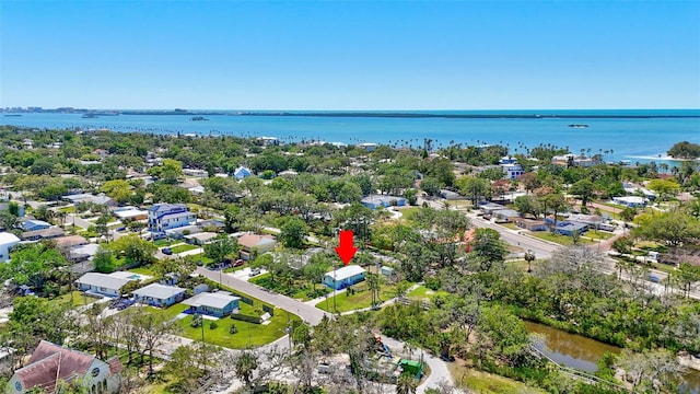 aerial view with a residential view and a water view