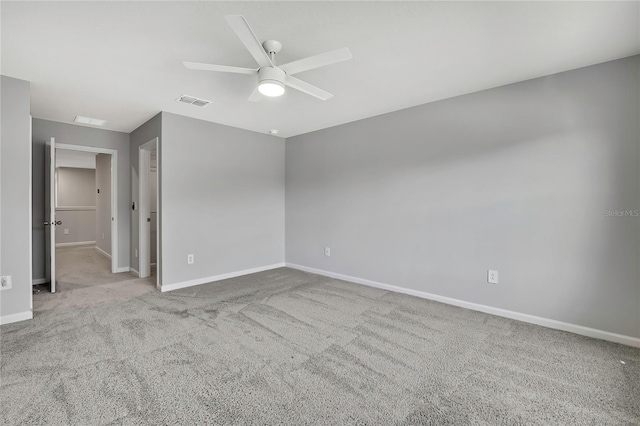 empty room with light carpet and ceiling fan