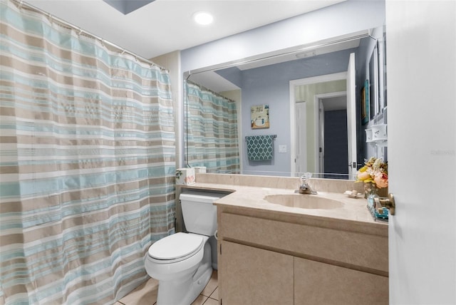 bathroom with tile patterned flooring, vanity, toilet, and a shower with shower curtain