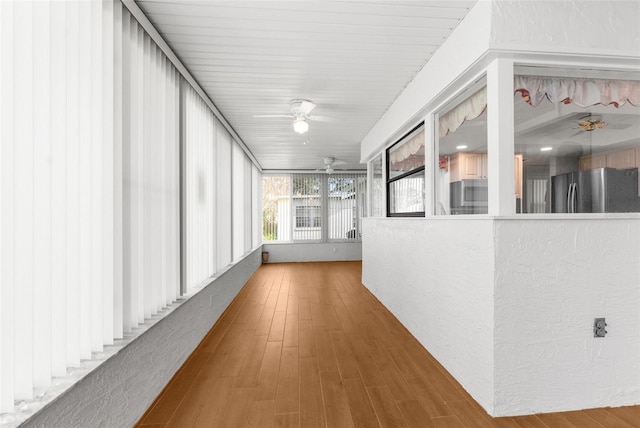 corridor featuring hardwood / wood-style flooring