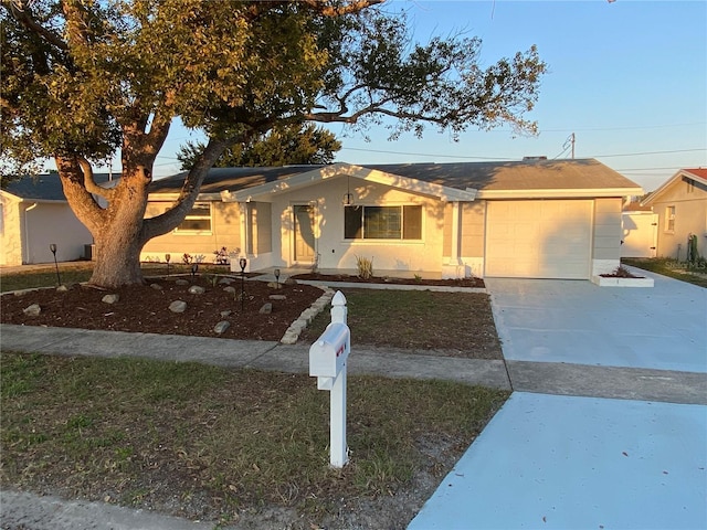 view of front of home featuring a garage