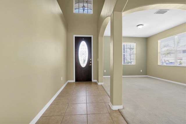 entrance foyer with light tile patterned flooring