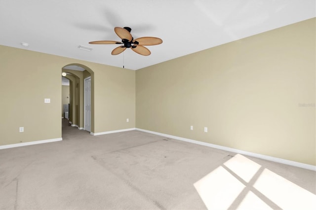 carpeted empty room with ceiling fan