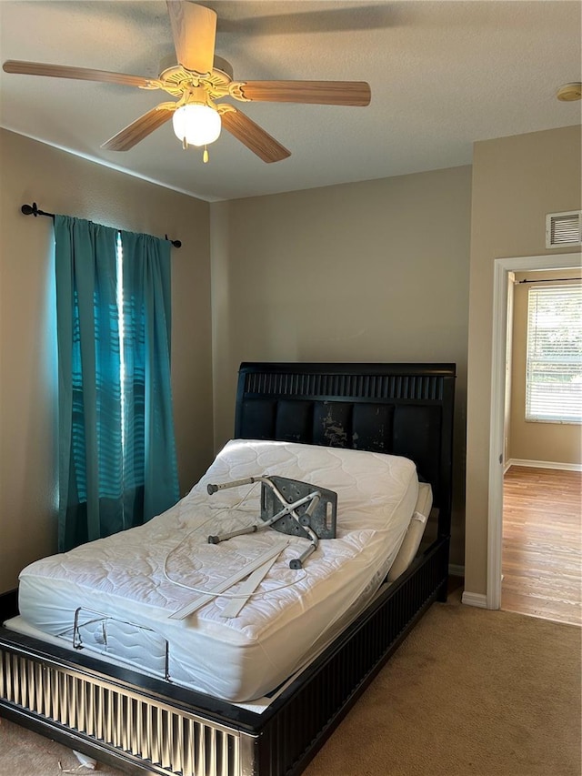 bedroom with carpet floors and ceiling fan