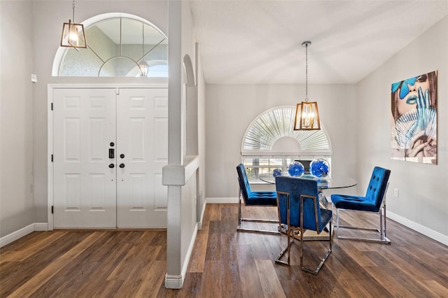 foyer with dark hardwood / wood-style floors