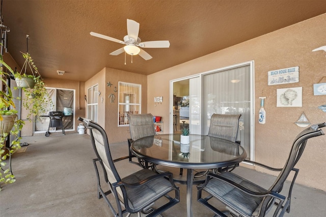 view of patio with ceiling fan