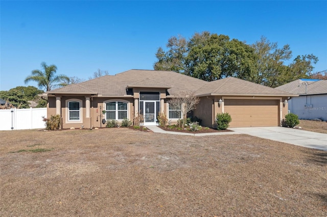 single story home with a garage