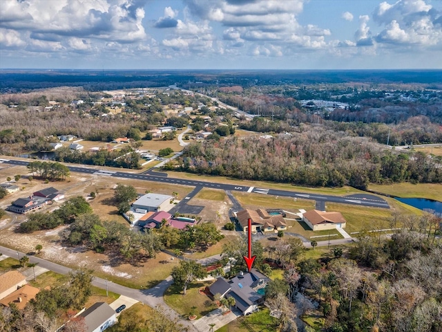 bird's eye view with a water view and a residential view