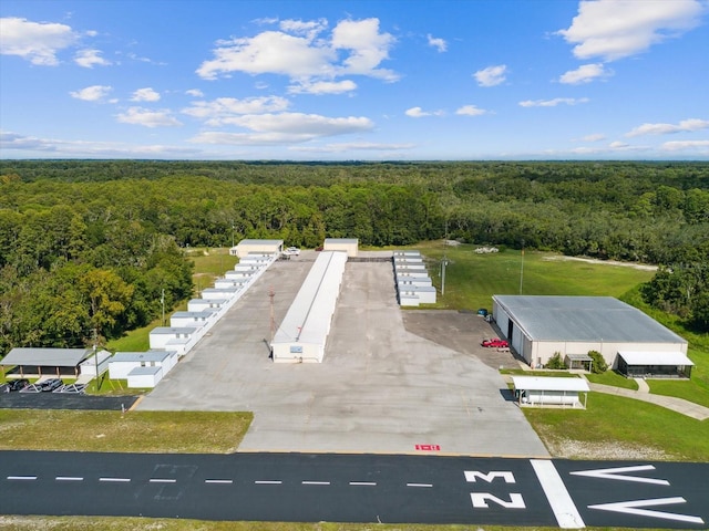 drone / aerial view with a view of trees