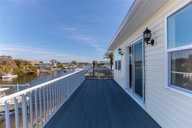 wooden terrace with a water view