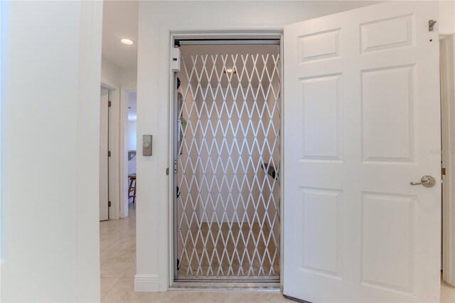 interior space featuring light tile patterned floors