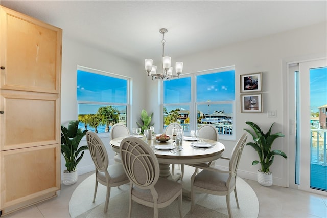 dining room featuring a notable chandelier