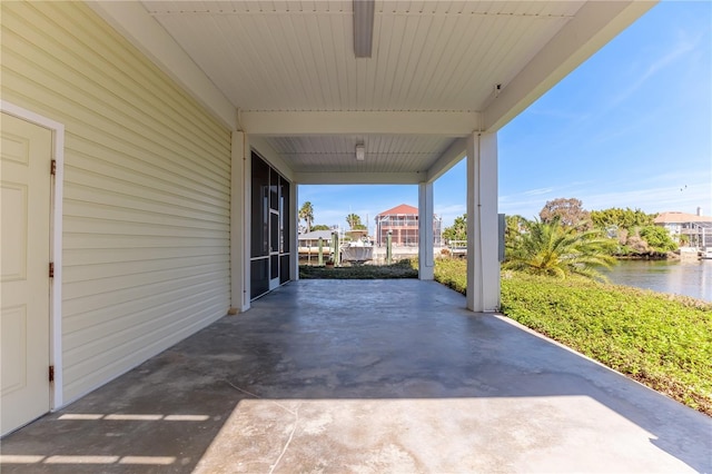 view of patio / terrace with a water view