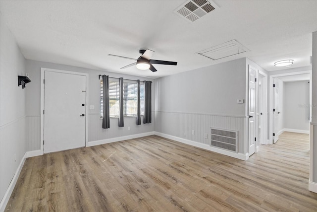 interior space featuring ceiling fan and light hardwood / wood-style flooring