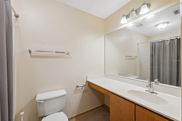 bathroom with walk in shower, tile patterned floors, toilet, and vanity