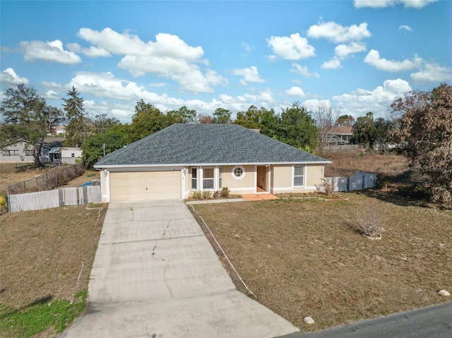 single story home featuring a garage and a front yard