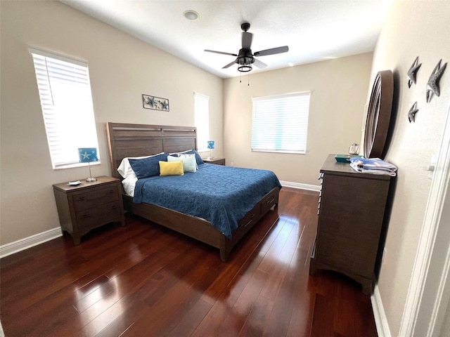 bedroom with dark wood-type flooring and ceiling fan