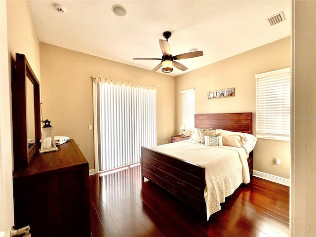 1421 Apollo Beach Blvd, Apollo Beach, FL 33572 - bedroom featuring visible vents, hardwood / wood-style floors, a ceiling fan, and baseboards