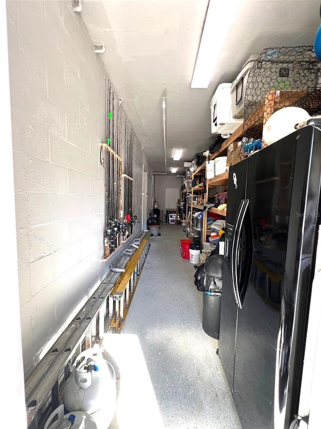 1421 Apollo Beach Blvd, Apollo Beach, FL 33572 - garage with black fridge with ice dispenser