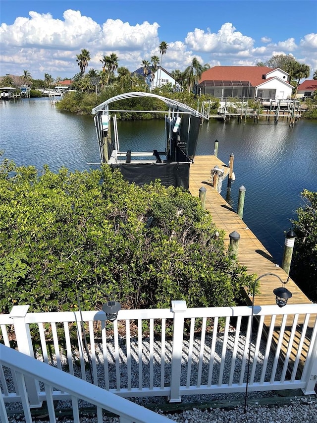 1421 Apollo Beach Blvd, Apollo Beach, FL 33572 - view of dock featuring a water view and boat lift